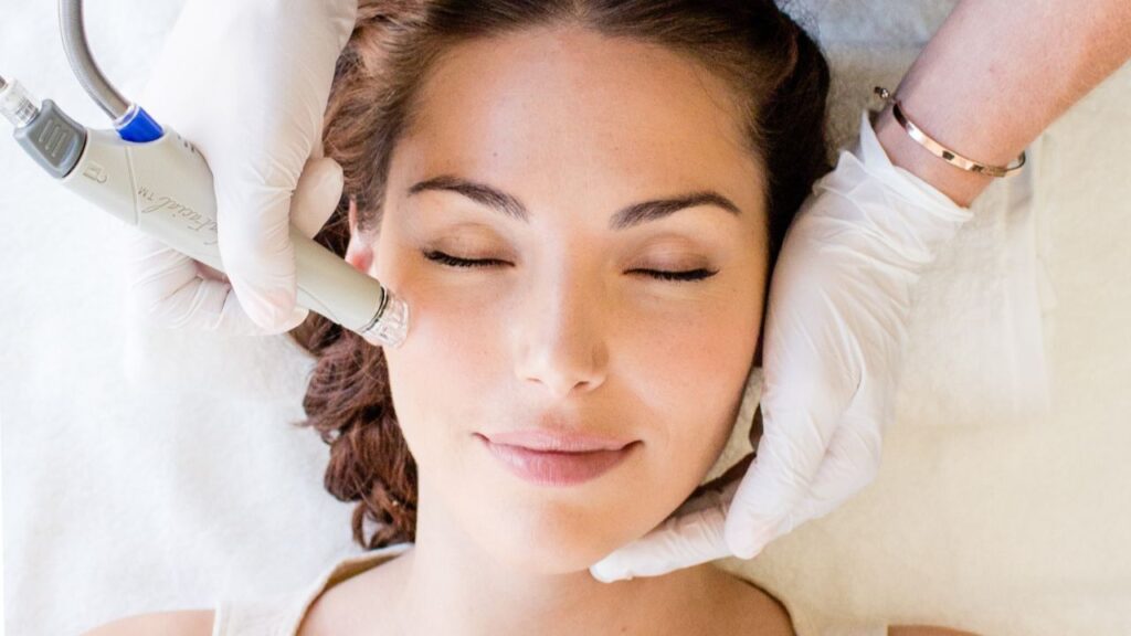 Young woman getting a hydrafacial